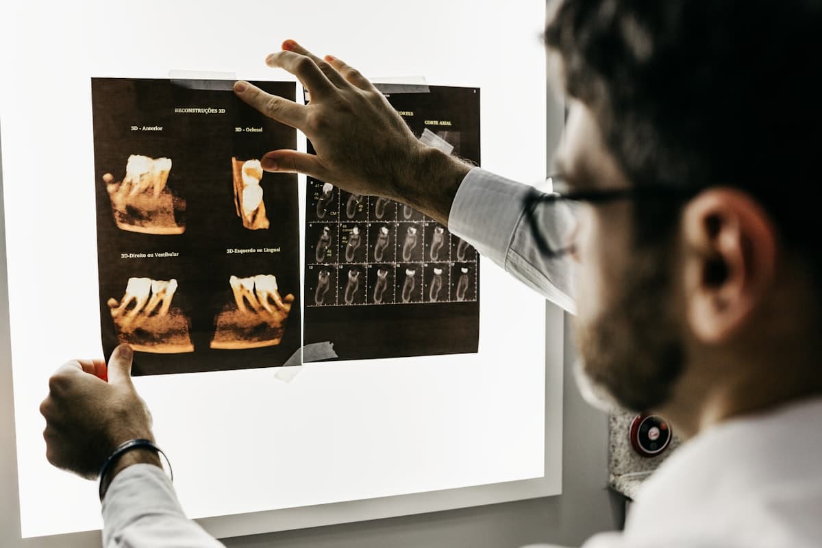 Dentist reviewing dental imaging